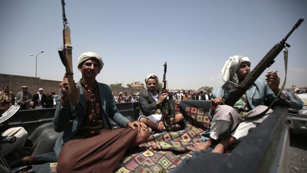 Tribesmen loyal to Houthi rebels ride on a patrol truck during a gathering aimed at mobilizing more fighters into battlefronts in several Yemeni cities, in Sanaa, Yemen, Thursday, Aug. 11, 2016. - Sputnik International