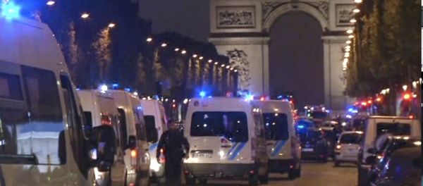 In this image made from video, police attend the scene after an incident on the Champs-Elysees in Paris, Thursday April 20, 2017. In this image made from video, police attend the scene after an incident on the Champs-Elysees in Paris, Thursday April 20, 2017. - Sputnik International