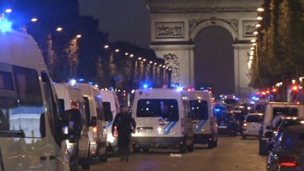 In this image made from video, police attend the scene after an incident on the Champs-Elysees in Paris, Thursday April 20, 2017. In this image made from video, police attend the scene after an incident on the Champs-Elysees in Paris, Thursday April 20, 2017. - Sputnik International