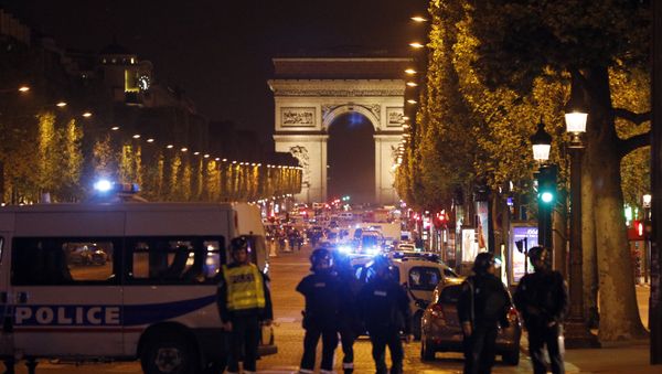 Police seal off the Champs Elysees avenue in Paris, France, after a fatal shooting in which a police officer was killed along with an attacker, Thursday, April 20, 2017. Police seal off the Champs Elysees avenue in Paris, France, after a fatal shooting in which a police officer was killed along with an attacker, Thursday, April 20, 2017. - Sputnik International