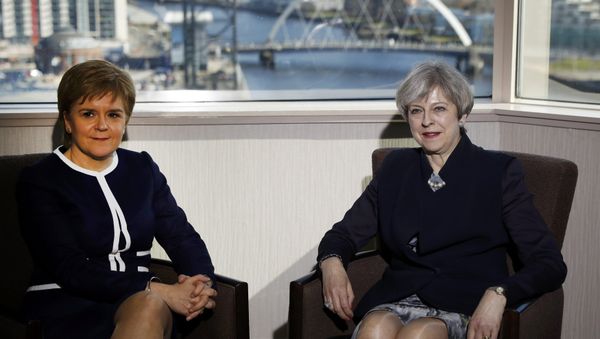 Britain's Prime Minister Theresa May and Scotland's First Minister Nicola Sturgeon meet in a hotel in Glasgow, Scotland, March 27, 2017. Britain's Prime Minister Theresa May and Scotland's First Minister Nicola Sturgeon meet in a hotel in Glasgow, Scotland, March 27, 2017. - Sputnik International