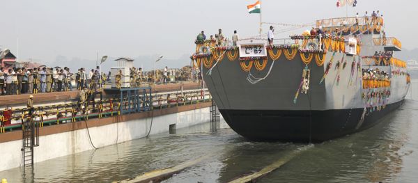 A Landing Craft Utility (LCU) ship rolls into the Ganges River as workers watch during its launching ceremony in Kolkata, India. (File) A Landing Craft Utility (LCU) ship rolls into the Ganges River as workers watch during its launching ceremony in Kolkata, India. (File) - Sputnik International