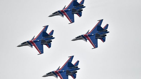 Su-30SM multipurpose fighter jets of the Russian Knights aerobatic display team during a rehearsal of the Victory Day parade air show. Su-30SM multipurpose fighter jets of the Russian Knights aerobatic display team during a rehearsal of the Victory Day parade air show. - Sputnik International