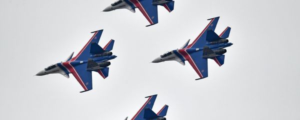 Su-30SM multipurpose fighter jets of the Russian Knights aerobatic display team during a rehearsal of the Victory Day parade air show. Su-30SM multipurpose fighter jets of the Russian Knights aerobatic display team during a rehearsal of the Victory Day parade air show. - Sputnik International