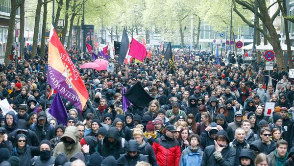 Activists protest against Germany's anti-immigration party Alternative for Germany (AFD) before the AFD's party congress in Cologne, German - Sputnik International