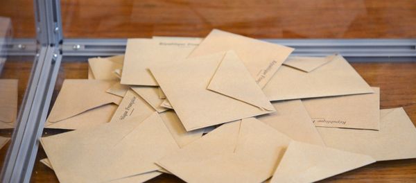 A ballot box with cast ballots at a polling station in Paris during the first round of the French presidential election. A ballot box with cast ballots at a polling station in Paris during the first round of the French presidential election. - Sputnik International