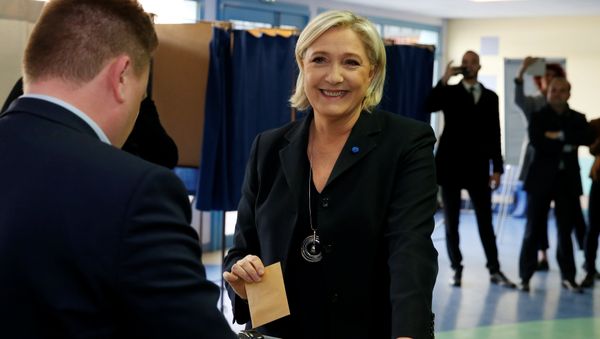 Marine Le Pen, French National Front (FN) political party leader and candidate for French 2017 presidential election, casts her ballot in the first round of 2017 French presidential election at a polling station in Henin-Beaumont, northern France, April 23, 2017. Marine Le Pen, French National Front (FN) political party leader and candidate for French 2017 presidential election, casts her ballot in the first round of 2017 French presidential election at a polling station in Henin-Beaumont, northern France, April 23, 2017. - Sputnik International