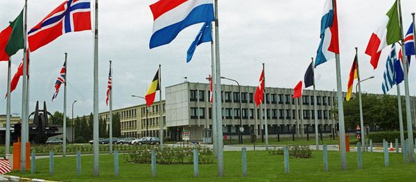 NATO member states' flags outside the European headquarters of the North Atlantic Treaty Organization in Brussels. (File) - Sputnik International