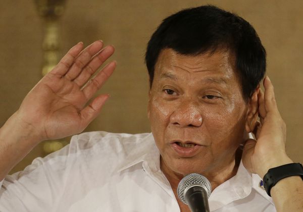 Philippine President Rodrigo Duterte gestures as he answers questions from reporters during a press conference Philippine President Rodrigo Duterte gestures as he answers questions from reporters during a press conference - Sputnik International