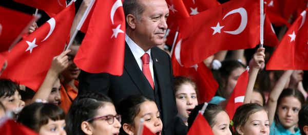 Turkish President Tayyip Erdogan poses with children during a ceremony to mark the National Sovereignty and Children's Day at the Presidential Palace in Ankara, Turkey, April 23, 2017. Turkish President Tayyip Erdogan poses with children during a ceremony to mark the National Sovereignty and Children's Day at the Presidential Palace in Ankara, Turkey, April 23, 2017. - Sputnik International