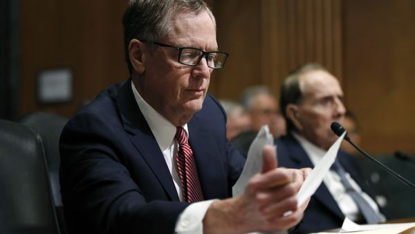 FILE - In this Tuesday, March 14, 2017, file photo, United States Trade Representative-nominee Robert Lighthizer, foreground, looks at documents during his confirmation hearing on Capitol Hill in Washington FILE - In this Tuesday, March 14, 2017, file photo, United States Trade Representative-nominee Robert Lighthizer, foreground, looks at documents during his confirmation hearing on Capitol Hill in Washington - Sputnik International