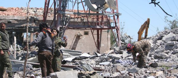 Fighters from the Kurdish People's Protection Units (YPG) inspect the damage at their headquarters after it was hit by Turkish airstrikes in Mount Karachok near Malikiya, Syria April 25, 2017 Fighters from the Kurdish People's Protection Units (YPG) inspect the damage at their headquarters after it was hit by Turkish airstrikes in Mount Karachok near Malikiya, Syria April 25, 2017 - Sputnik International