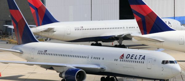 Delta Air Lines jets parked at John F. Kennedy International Airport Delta Air Lines jets parked at John F. Kennedy International Airport - Sputnik International