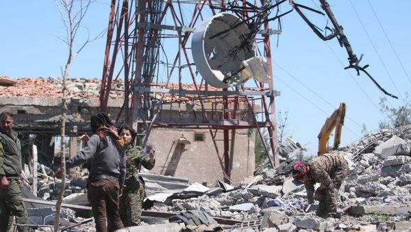 Fighters from the Kurdish People's Protection Units (YPG) inspect the damage at their headquarters after it was hit by Turkish airstrikes in Mount Karachok near Malikiya, Syria April 25, 2017 Fighters from the Kurdish People's Protection Units (YPG) inspect the damage at their headquarters after it was hit by Turkish airstrikes in Mount Karachok near Malikiya, Syria April 25, 2017 - Sputnik International