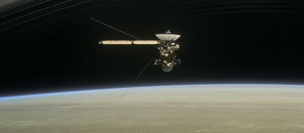 This image made available by NASA in April 2017 shows a still from the short film Cassini's Grand Finale, with the spacecraft diving between Saturn and the planet's innermost ring - Sputnik International