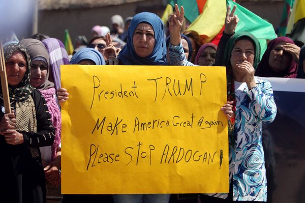 Kurdish women carry flags and a banner as they protest, in the northeastern city of Qamishli, against Turkish airstrikes on the headquarters of the Kurdish fighters from the People's Protection Units (YPG) in Mount Karachok on Tuesday, Syria April 26, 2017 Kurdish women carry flags and a banner as they protest, in the northeastern city of Qamishli, against Turkish airstrikes on the headquarters of the Kurdish fighters from the People's Protection Units (YPG) in Mount Karachok on Tuesday, Syria April 26, 2017 - Sputnik International