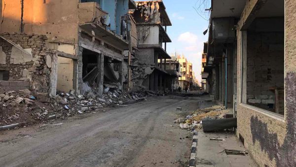 Buildings destroyed during combat activities in the residential part in Homs, Syria. (File) - Sputnik International