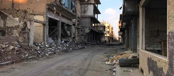 Buildings destroyed during combat activities in the residential part in Homs, Syria. (File) - Sputnik International