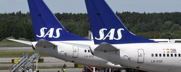 Two of Scandinavian airline (SAS) Boeing 737 aircrafts parked at Terminal 4 at Arlanda Airport in Stockholm, Sweden - Sputnik International