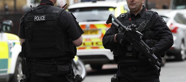 Armed police officers patrol the streets near Southwark Cathedral ahead of the funeral of PC Keith Palmer, who was killed in the recent Westminster attack, in central London, Britain April 10, 2017. - Sputnik International