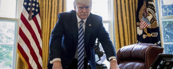 In this April 21, 2017, file photo, President Donald Trump poses for a portrait in the Oval Office in Washington after an interview with The Associated Press. In this April 21, 2017, file photo, President Donald Trump poses for a portrait in the Oval Office in Washington after an interview with The Associated Press. - Sputnik International