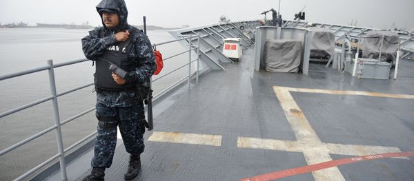 An US Navy officer walks on deck at the USS cruiser Vella Gulf missile cruiser. (File) - Sputnik International