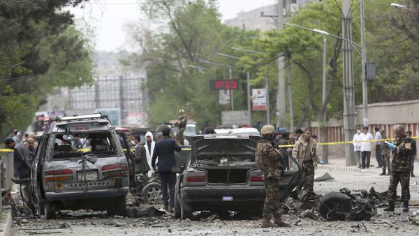 Security forces inspect the site of a suicide attack in Kabul, Afghanistan, Wednesday, May 3 , 2017 Security forces inspect the site of a suicide attack in Kabul, Afghanistan, Wednesday, May 3 , 2017 - Sputnik International