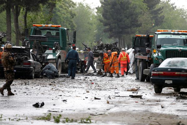 Afghan police and municipal workers clear debris from the site of a suicide bomb attack in Kabul, Afghanistan May 3, 2017 Afghan police and municipal workers clear debris from the site of a suicide bomb attack in Kabul, Afghanistan May 3, 2017 - Sputnik International