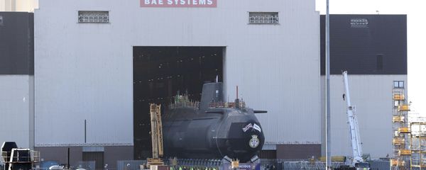 HMS Audacious, the fourth Astute-class nuclear-powered submarine of the Royal Navy, is taken out of the indoor ship building complex at BAE Systems, Burrow-in-Furness, England, Thursday April 27, 2017. HMS Audacious is due to be launched later in 2017. - Sputnik International