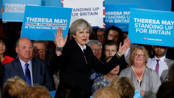 Britain's Prime Minister Theresa May delivers a speech to Conservative Party members in Mawdesley village hall, Ormskirk, Britain May 1, 2017 Britain's Prime Minister Theresa May delivers a speech to Conservative Party members in Mawdesley village hall, Ormskirk, Britain May 1, 2017 - Sputnik International