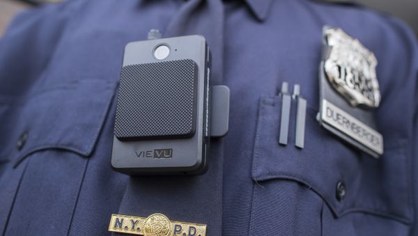 A police officer wears a newly issued body camera outside the 34th precinct, Thursday, April 27, 2017, in New York. A police officer wears a newly issued body camera outside the 34th precinct, Thursday, April 27, 2017, in New York. - Sputnik International