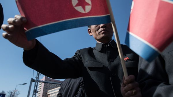 People at a ceremony to open a new residential area on Ryomyong Street in Pyongyang. - Sputnik International