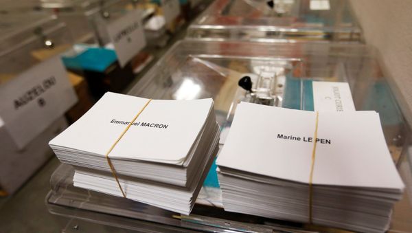 Ballots with the names of 2017 French presidential election candidates Emmanuel Macron (L) and Marine Le Pen are seen near ballot boxes on the eve of the second round of the French presidential election, at a polling station in Tulle, France, May 6, 2017 Ballots with the names of 2017 French presidential election candidates Emmanuel Macron (L) and Marine Le Pen are seen near ballot boxes on the eve of the second round of the French presidential election, at a polling station in Tulle, France, May 6, 2017 - Sputnik International