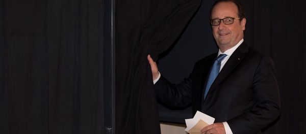 French President Francois Hollande prepares to vote in the second round of 2017 French presidential election at a polling station in Tulle, France French President Francois Hollande prepares to vote in the second round of 2017 French presidential election at a polling station in Tulle, France - Sputnik International