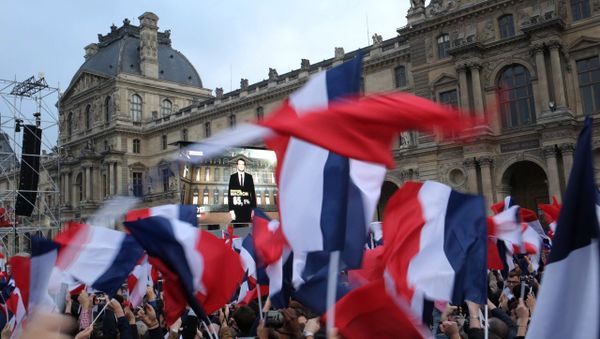 President Elect Emmanuel Macron is seen on a giant screen near the Louvre museum after results were announced in the second round vote of the 2017 French presidential elections President Elect Emmanuel Macron is seen on a giant screen near the Louvre museum after results were announced in the second round vote of the 2017 French presidential elections - Sputnik International