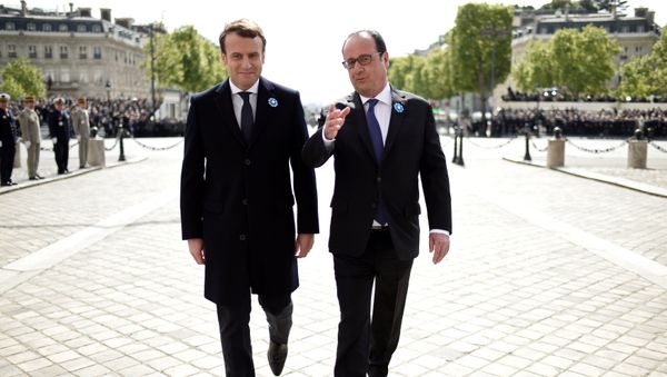 Outgoing French President Francois Hollande (R) and President-elect Emmanuel Macron attend a ceremony to mark the end of World War II at the Tomb of the Unknown Soldier at the Arc de Triomphe in Paris, France, May 8, 2017. Outgoing French President Francois Hollande (R) and President-elect Emmanuel Macron attend a ceremony to mark the end of World War II at the Tomb of the Unknown Soldier at the Arc de Triomphe in Paris, France, May 8, 2017. - Sputnik International
