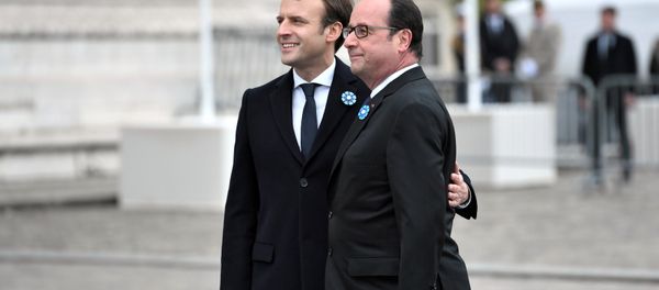 Outgoing French President Francois Hollande (R) and President-elect Emmanuel Macron attend a ceremony to mark the end of World War II at the Tomb of the Unknown Soldier at the Arc de Triomphe in Paris, France, May 8, 2017. Outgoing French President Francois Hollande (R) and President-elect Emmanuel Macron attend a ceremony to mark the end of World War II at the Tomb of the Unknown Soldier at the Arc de Triomphe in Paris, France, May 8, 2017. - Sputnik International