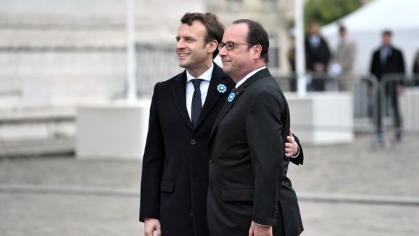 Outgoing French President Francois Hollande (R) and President-elect Emmanuel Macron attend a ceremony to mark the end of World War II at the Tomb of the Unknown Soldier at the Arc de Triomphe in Paris, France, May 8, 2017. Outgoing French President Francois Hollande (R) and President-elect Emmanuel Macron attend a ceremony to mark the end of World War II at the Tomb of the Unknown Soldier at the Arc de Triomphe in Paris, France, May 8, 2017. - Sputnik International