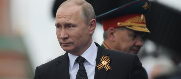 Russian President Vladimir Putin and Defense Minister Sergei Shoigu - Sputnik International