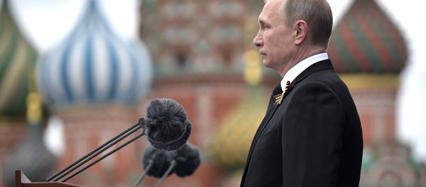 Russian President Vladimir Putin speaks during the Victory Day military parade marking the World War II anniversary at Red Square in Moscow. - Sputnik International