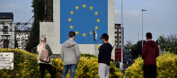 An artwork attributed to street artist Banksy, depicting a workman chipping away at one of the 12 stars on the flag of the European Union, is seen on a wall in the ferry port of Dover, Britain May 7, 2017. An artwork attributed to street artist Banksy, depicting a workman chipping away at one of the 12 stars on the flag of the European Union, is seen on a wall in the ferry port of Dover, Britain May 7, 2017. - Sputnik International
