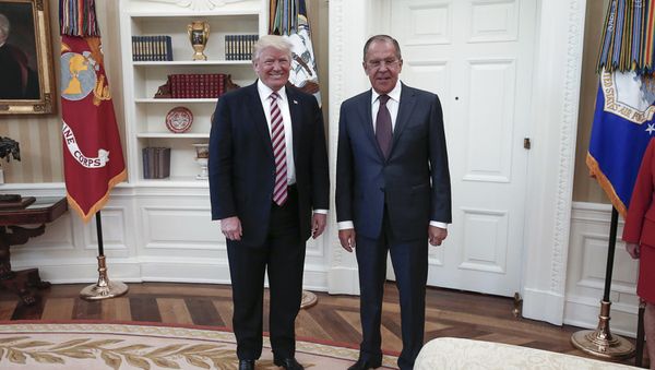 A handout photo made available by the Russian Foreign Ministry on May 10, 2017 shows US President Donald J. Trump (L) posing with Russian Foreign Minister Sergei Lavrov during a meeting at the White House in Washington, DC. A handout photo made available by the Russian Foreign Ministry on May 10, 2017 shows US President Donald J. Trump (L) posing with Russian Foreign Minister Sergei Lavrov during a meeting at the White House in Washington, DC. - Sputnik International