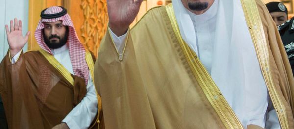 In this photo released by the Saudi Press Agency, SPA, Saudi King Salman, right, and Defense Minister and Deputy Crown Prince Mohammed bin Salman wave as they leave the hall after talks with the British prime minister, in Riyadh, Saudi Arabia, Wednesday, April 5, 2017. - Sputnik International