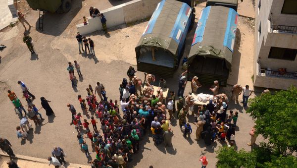 Russian humanitarian aid is distributed at Ras al-Bassit refugee camp - Sputnik International