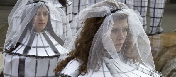 Students dressed as caged brides to raise awareness to the risks of human trafficking and sexual exploitation Students dressed as caged brides to raise awareness to the risks of human trafficking and sexual exploitation - Sputnik International