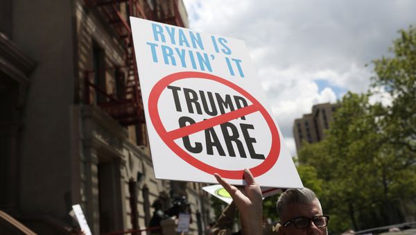 Demonstrators and healthcare activists rally before the visit of Speaker of the U.S. House of Representatives Paul Ryan at the Success Academy 1 charter school in Harlem, New York, U.S., May 9, 2017 Demonstrators and healthcare activists rally before the visit of Speaker of the U.S. House of Representatives Paul Ryan at the Success Academy 1 charter school in Harlem, New York, U.S., May 9, 2017 - Sputnik International