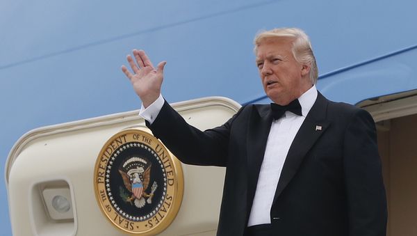 President Donald Trump waves as he steps out of Air Force One during his arrival at JFK International airport in New York, Thursday, May 4, 2017 - Sputnik International