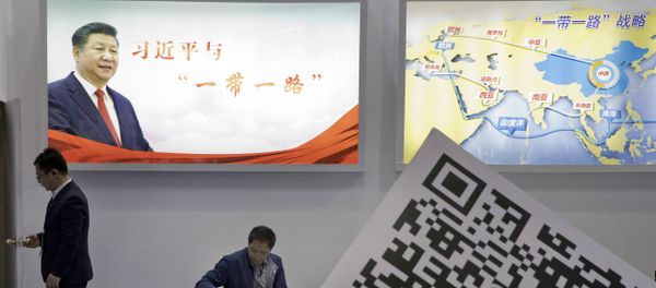 Visitors at a technology conference wait near illuminated boards highlighting Chinese President Xi Jinping's signature One Belt, One Road foreign policy plan in Beijing, China, Friday, April 28, 2017 Visitors at a technology conference wait near illuminated boards highlighting Chinese President Xi Jinping's signature One Belt, One Road foreign policy plan in Beijing, China, Friday, April 28, 2017 - Sputnik International