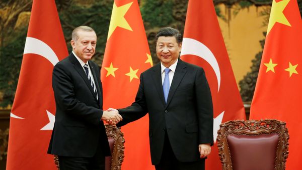Turkish President Recep Tayyip Erdogan and Chinese President Xi Jinping attend a signing ceremony ahead of the Belt and Road Forum in Beijing, China May 13, 2017 - Sputnik International
