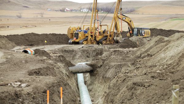 Construction equipment sits near a Dakota Access Pipeline construction site off County Road 135 near the town of Cannon Ball, North Dakota, U.S. on October 30, 2016 - Sputnik International